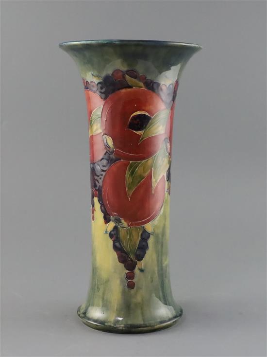 An early Moorcroft pomegranate trumpet shaped vase, c.1917, H.31.5cm, slight faults